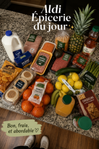 Panier de courses rempli de produits Aldi sur une table de cuisine